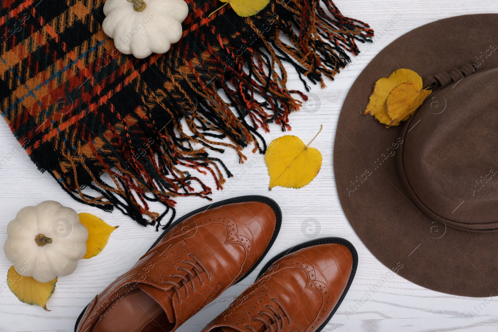 Photo of Fall fashion. Layout of women's outfit on white wooden background, top view