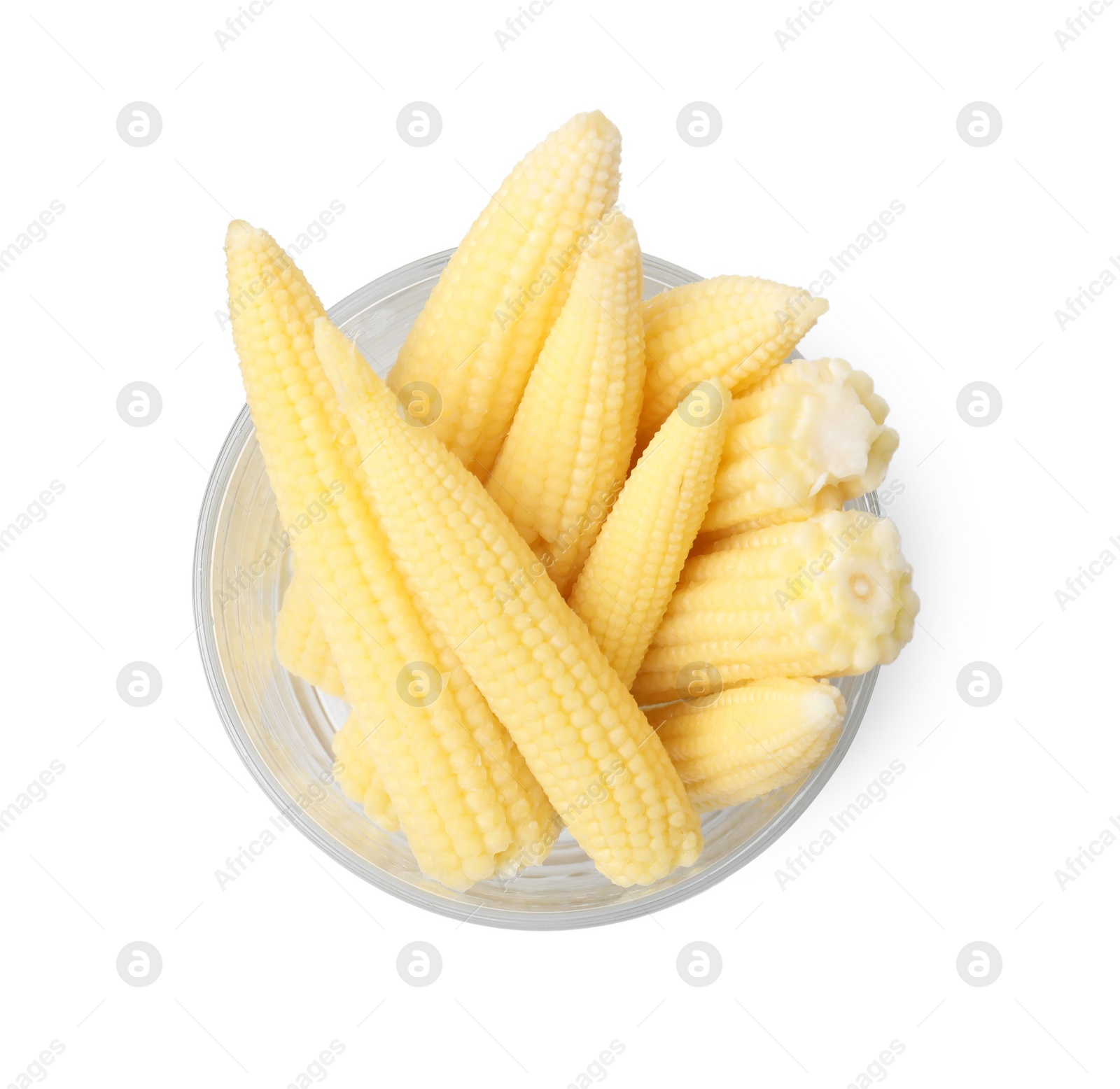 Photo of Tasty fresh baby corn in glass isolated on white, top view