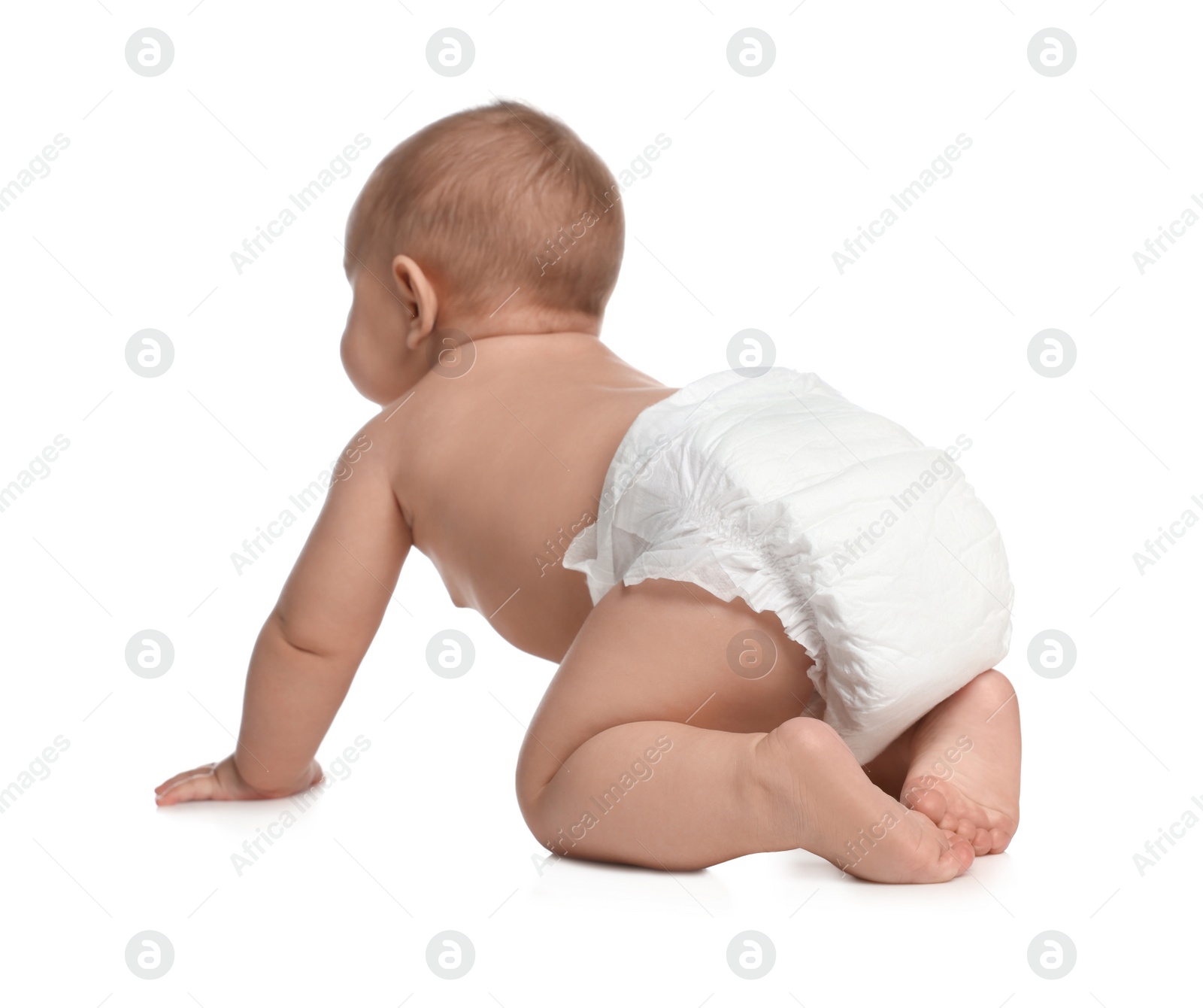 Photo of Cute little baby in diaper crawling on white background