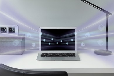 Image of Speed internet. Modern laptop on white table. Motion blur effect symbolizing fast connection