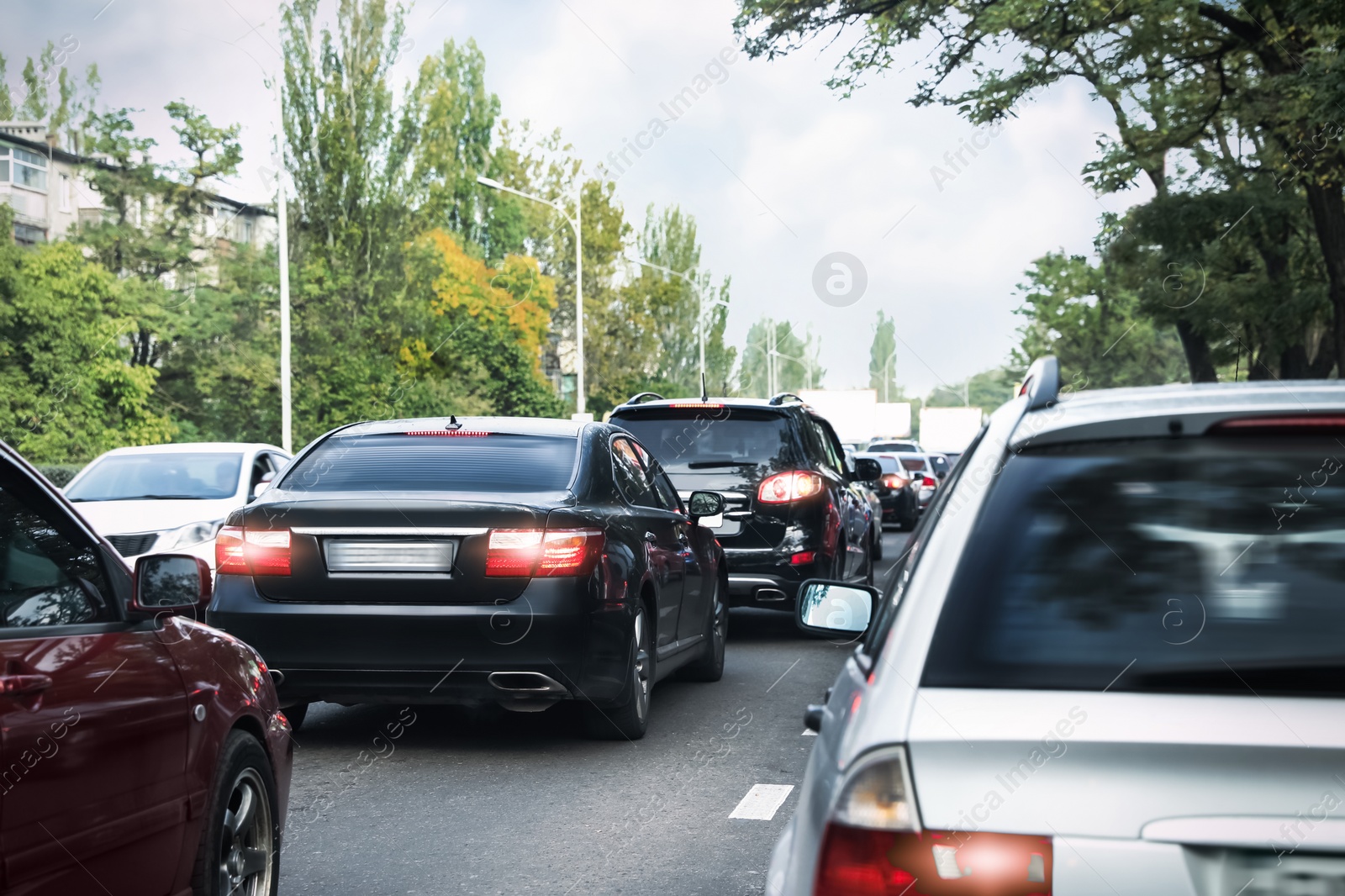 Photo of Cars in traffic jam on city street