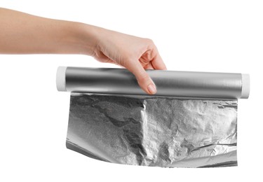 Woman holding roll of aluminum foil on white background, closeup