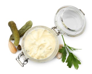 Tartar sauce and ingredients on white background, top view