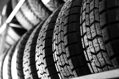 Car tires in automobile service center, closeup