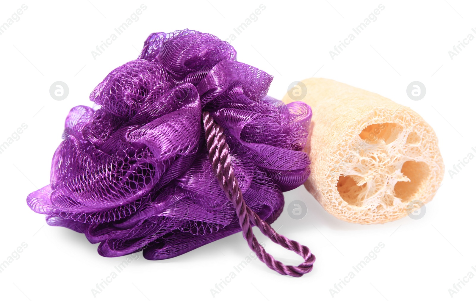 Photo of New shower puff and loofah sponge on white background. Personal hygiene