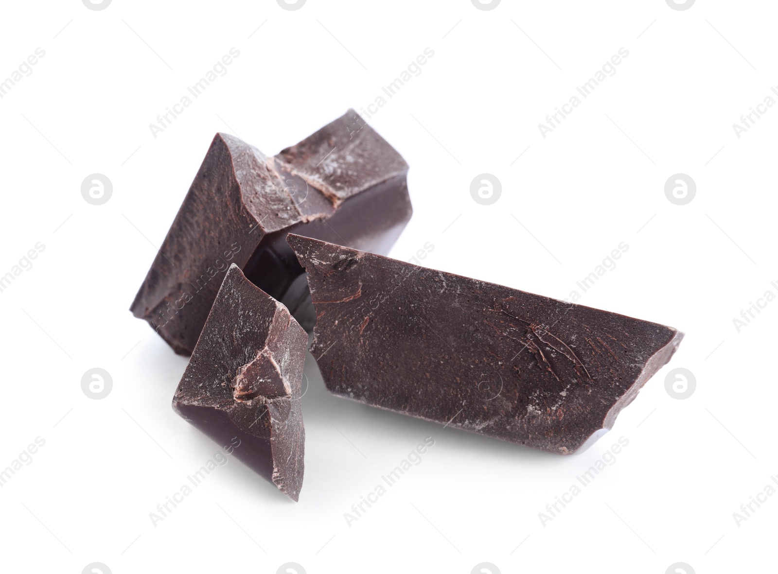 Photo of Pieces of dark chocolate isolated on white