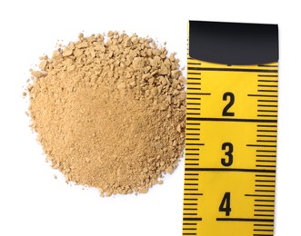 Photo of Pile of sand and measuring tape on white background, top view. Kidney stone disease