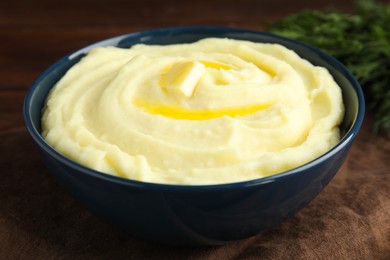 Photo of Freshly cooked homemade mashed potatoes on table, closeup