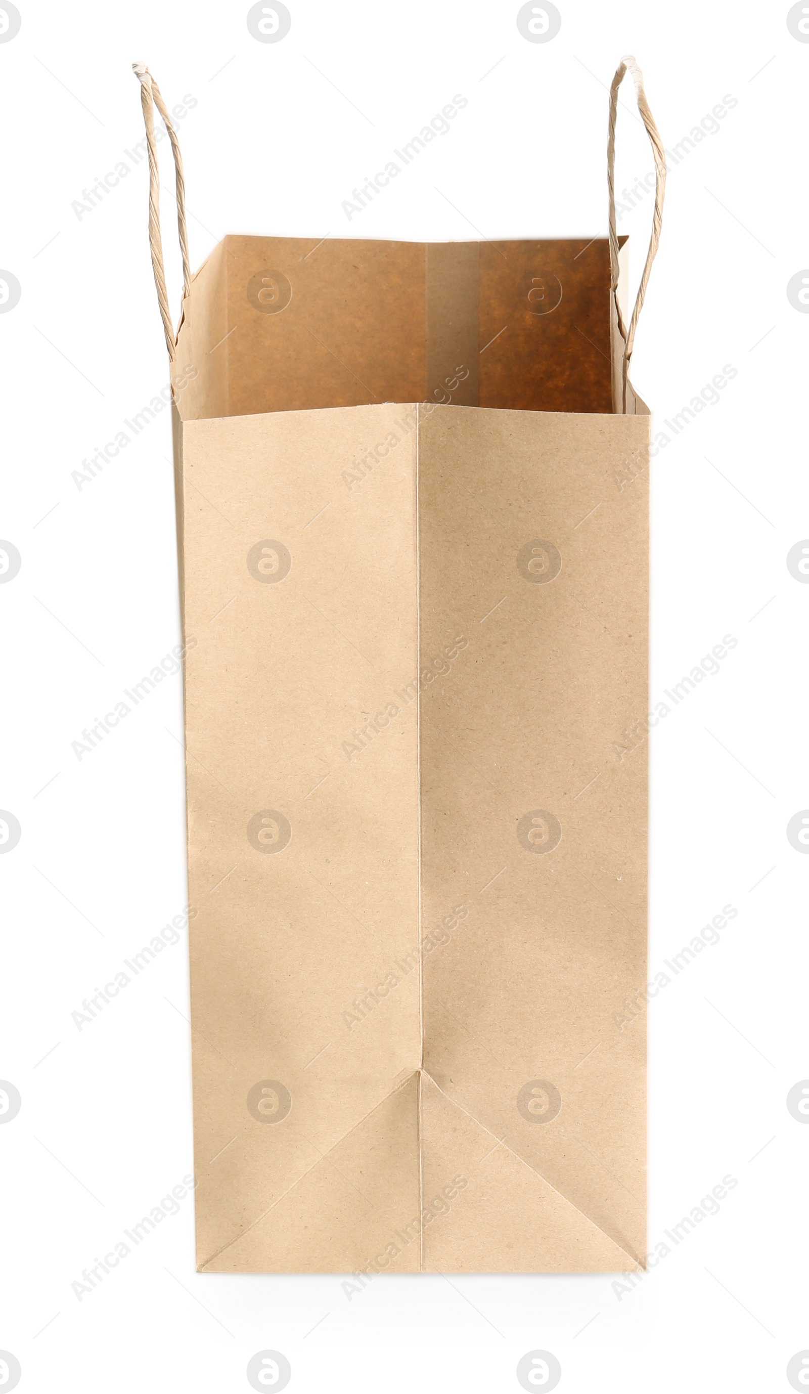 Photo of One kraft paper bag isolated on white. Mockup for design