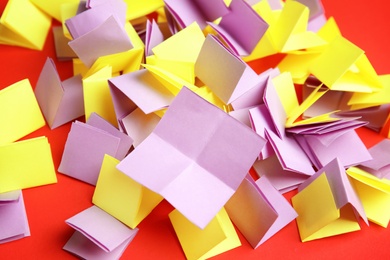 Pile of paper pieces for lottery on color background
