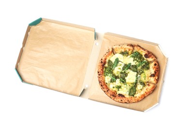 Photo of Delicious pizza with pesto, cheese and arugula in cardboard box on white background, top view