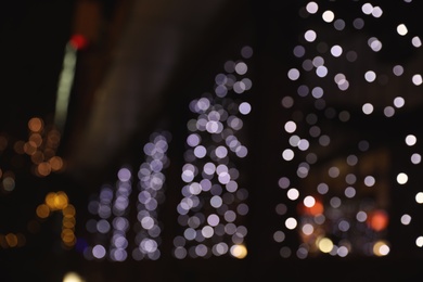 Photo of Beautiful street lights at night. Bokeh effect