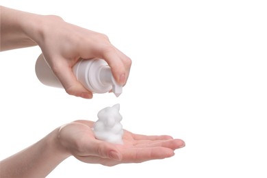 Photo of Woman applying cleansing foam onto hand on white background, closeup