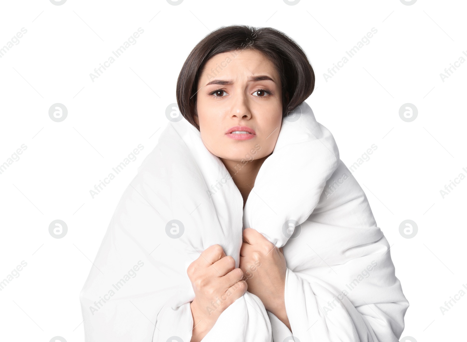 Photo of Young woman wrapped in blanket  suffering from cold on white background