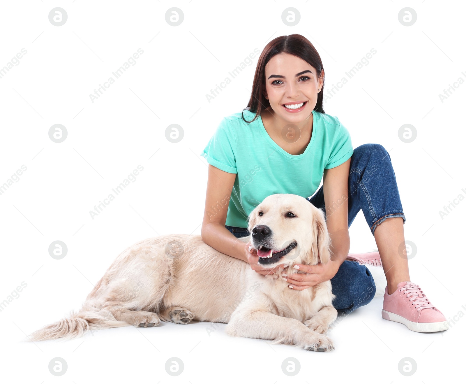 Photo of Young woman and her Golden Retriever dog on white background