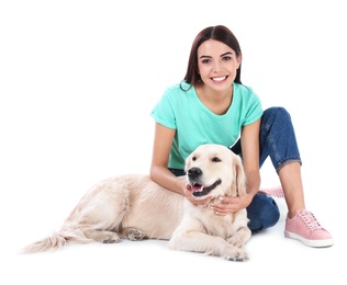 Young woman and her Golden Retriever dog on white background