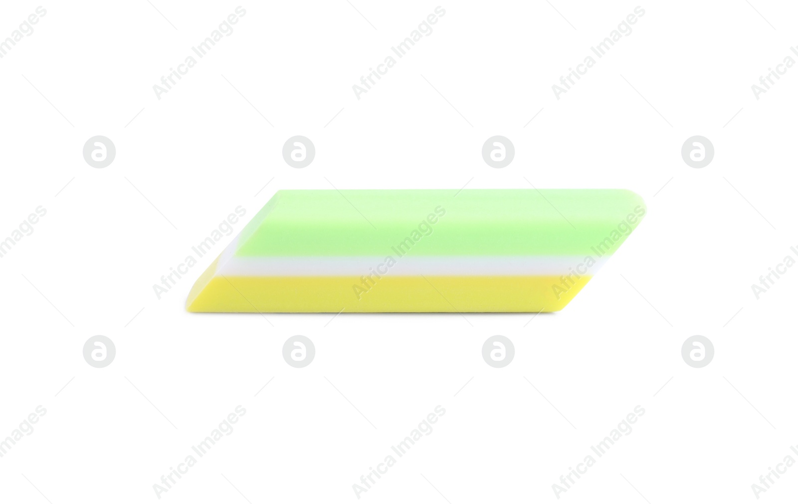 Photo of New eraser isolated on white. School stationery