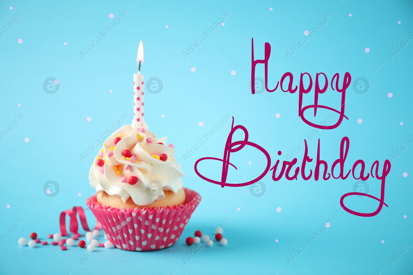 Image of Text Happy Birthday and delicious cupcake with candle on light blue background