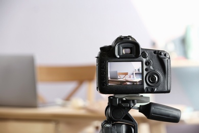 Photo of blogger's workplace on camera screen, closeup with space for text