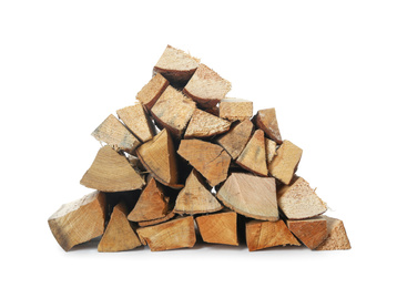 Stack of cut firewood on white background