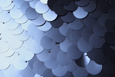 Photo of Texture of beautiful silver sequins as background, closeup
