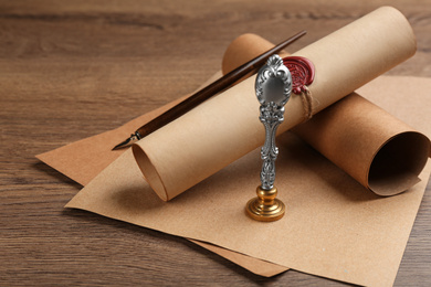 Notary's public pen and sealed document on wooden table