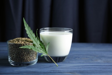 Photo of Composition with hemp milk and seeds on table