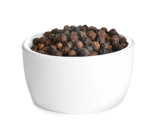 Photo of Bowl of black peppercorns isolated on white