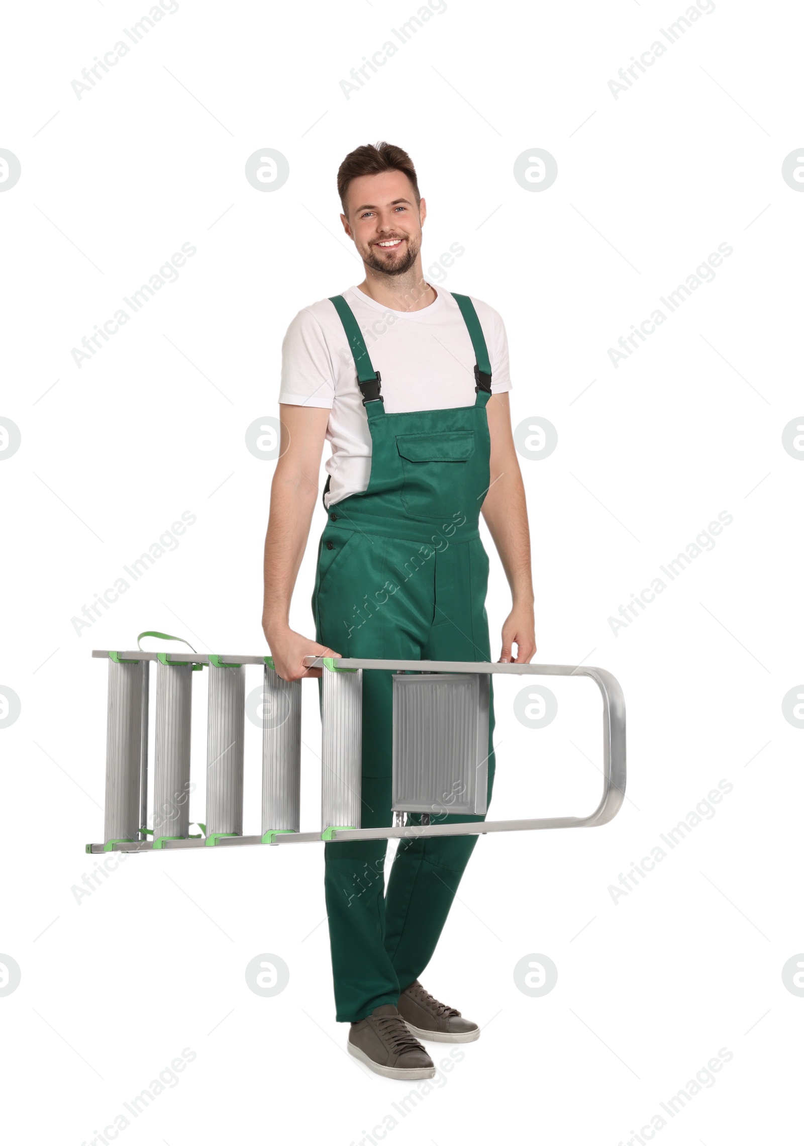 Photo of Worker in uniform holding metal ladder on white background