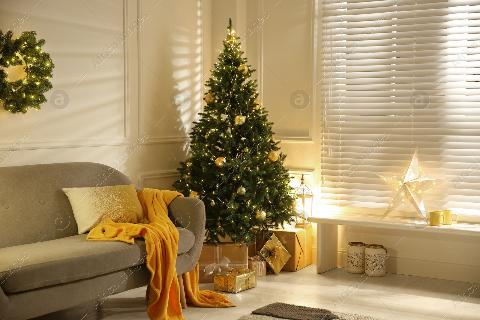 Photo of Stylish room with Christmas decorations. Festive interior design