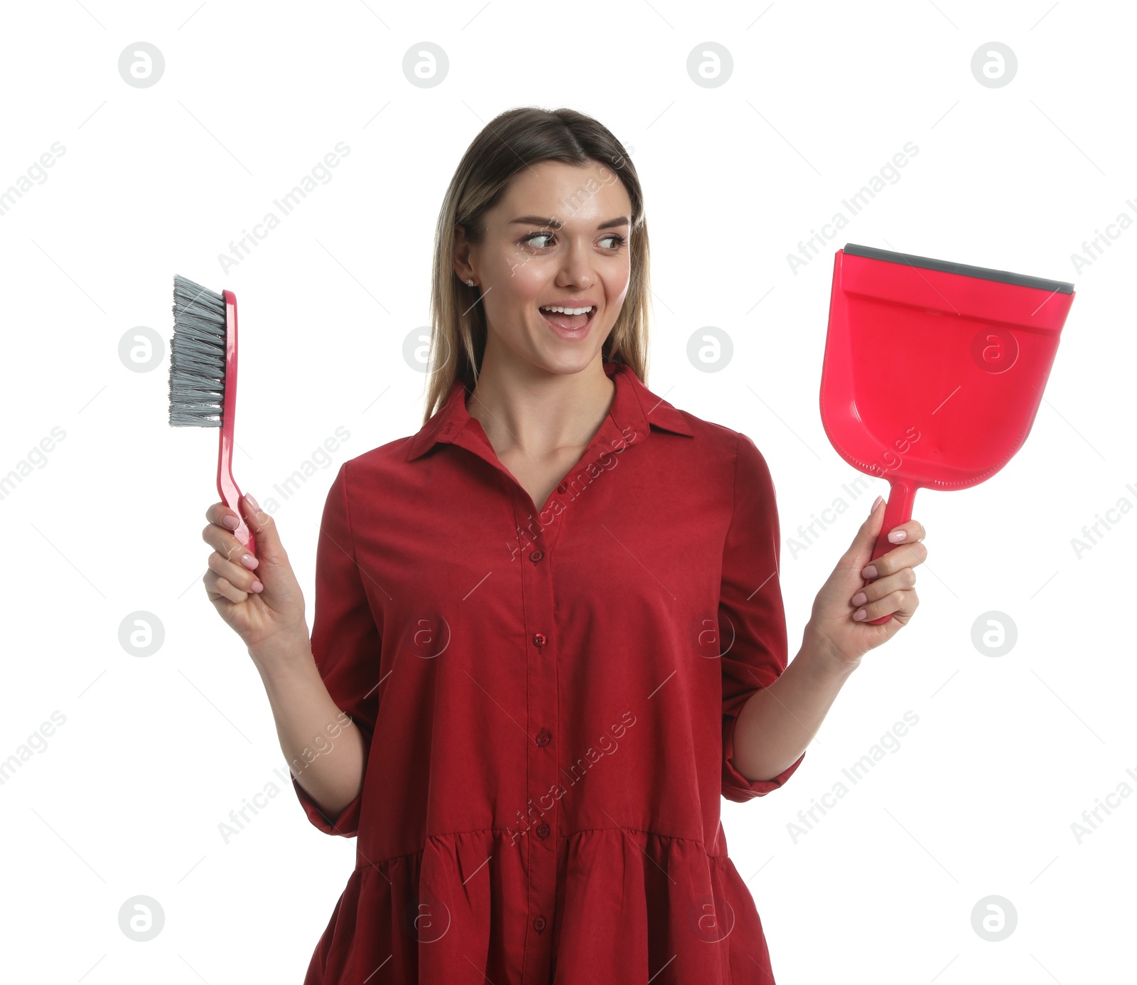 Photo of Young woman with broom and dustpan on white background
