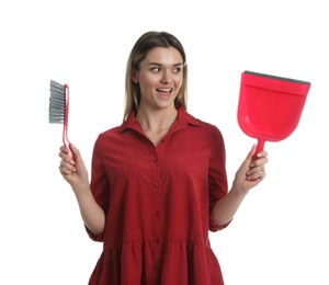 Photo of Young woman with broom and dustpan on white background