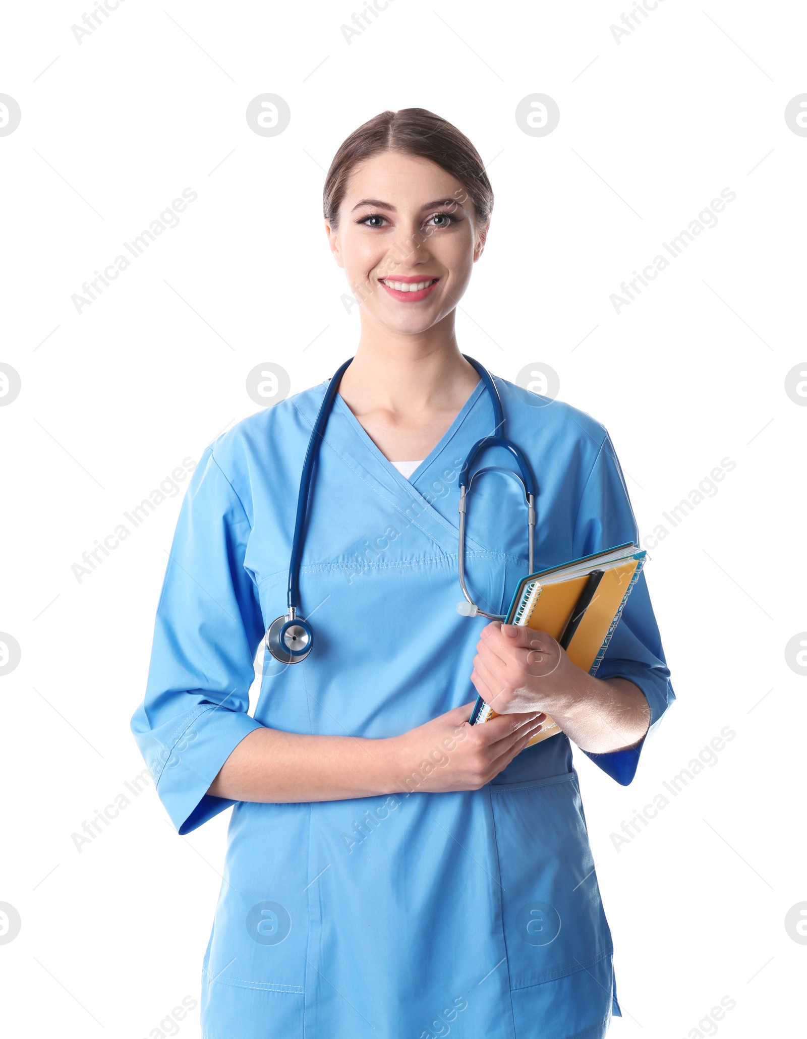 Photo of Young medical student with notebooks on white background