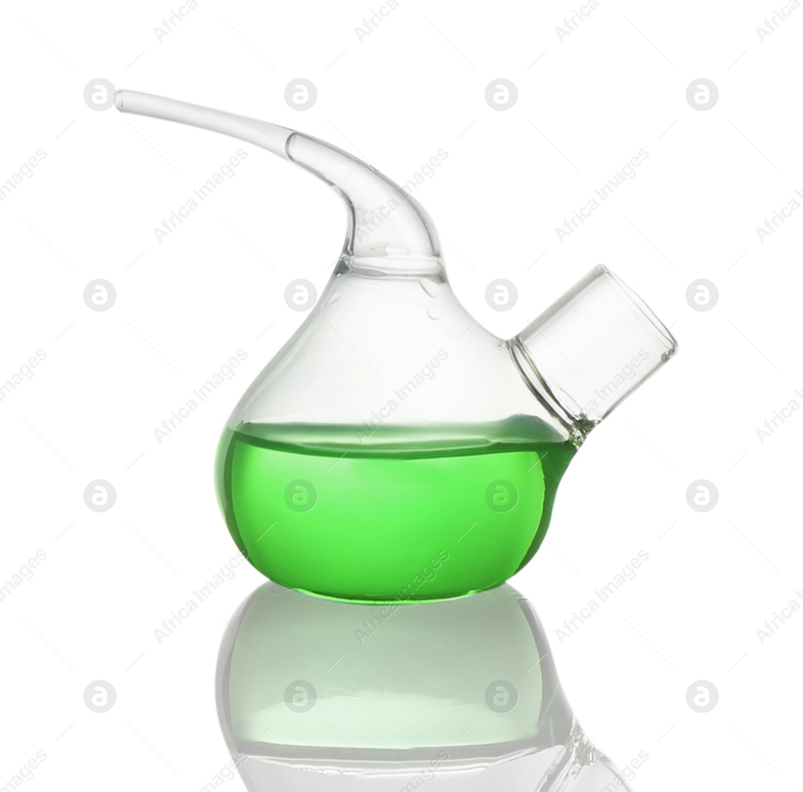 Photo of Retort flask with light green liquid isolated on white