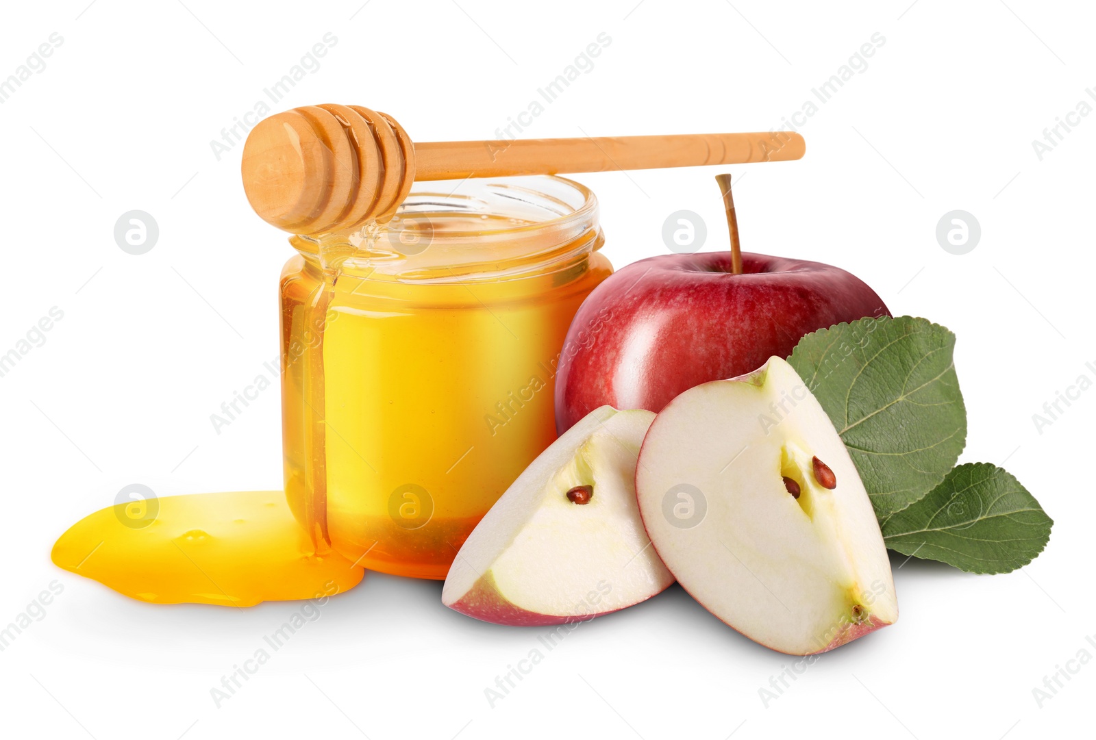 Image of Honey in glass jar, apples and dipper isolated on white