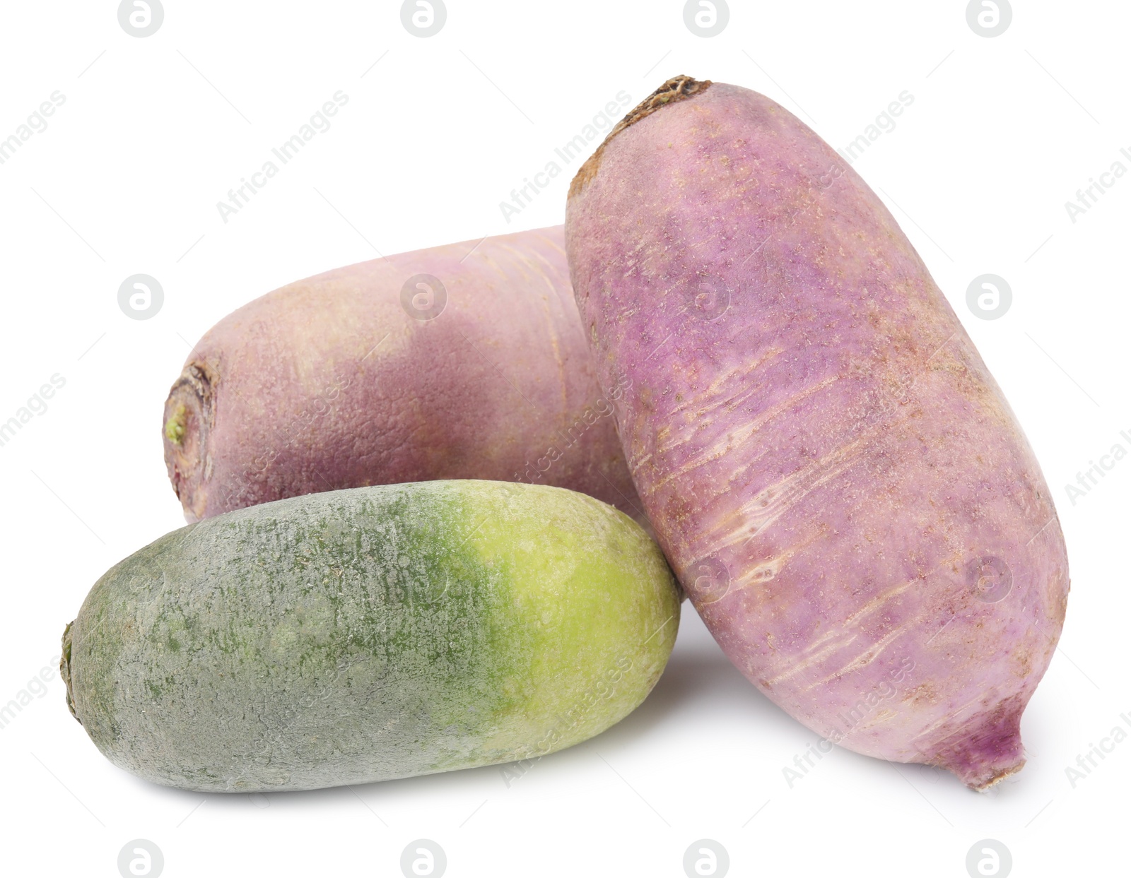 Photo of Purple and green daikon radishes isolated on white