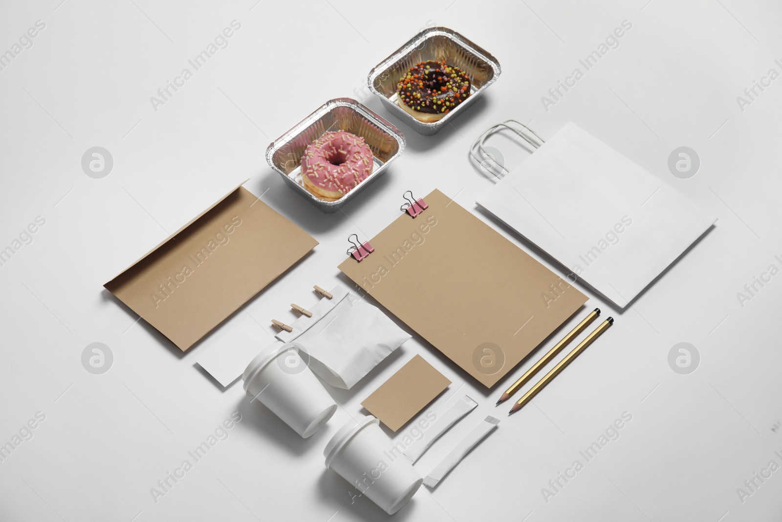 Photo of Composition with items for mock up design on light background. Food delivery service