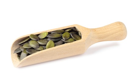 Photo of Wooden scoop with pumpkin seeds isolated on white