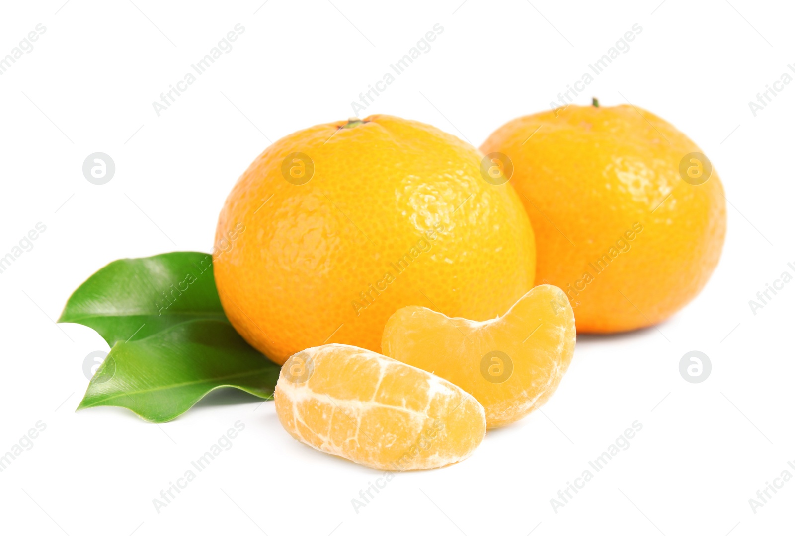 Photo of Tasty ripe tangerines with leaves on white background