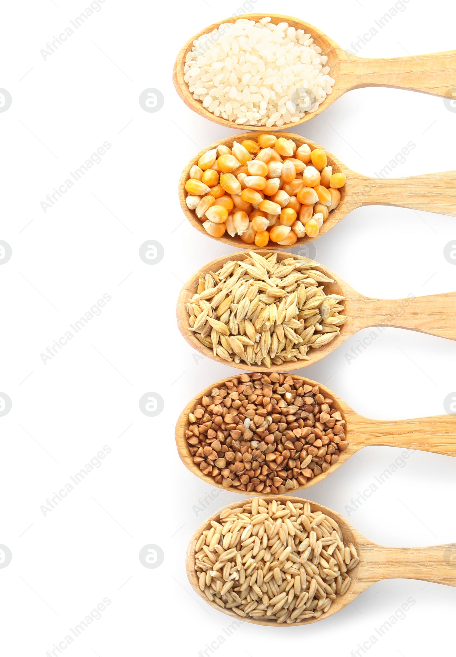 Photo of Spoons with different types of grains and cereals on white background