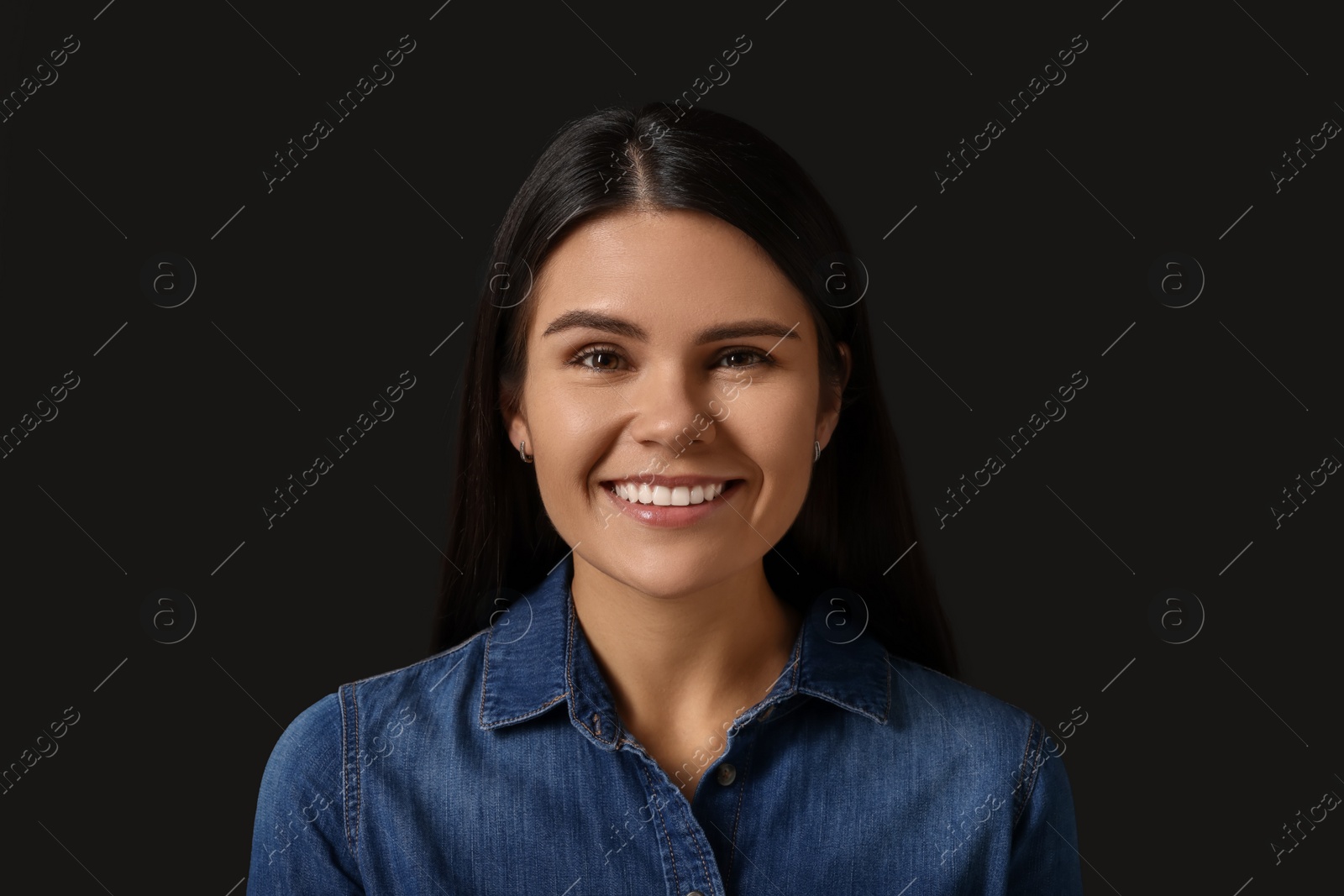 Photo of Personality concept. Emotional woman on black background