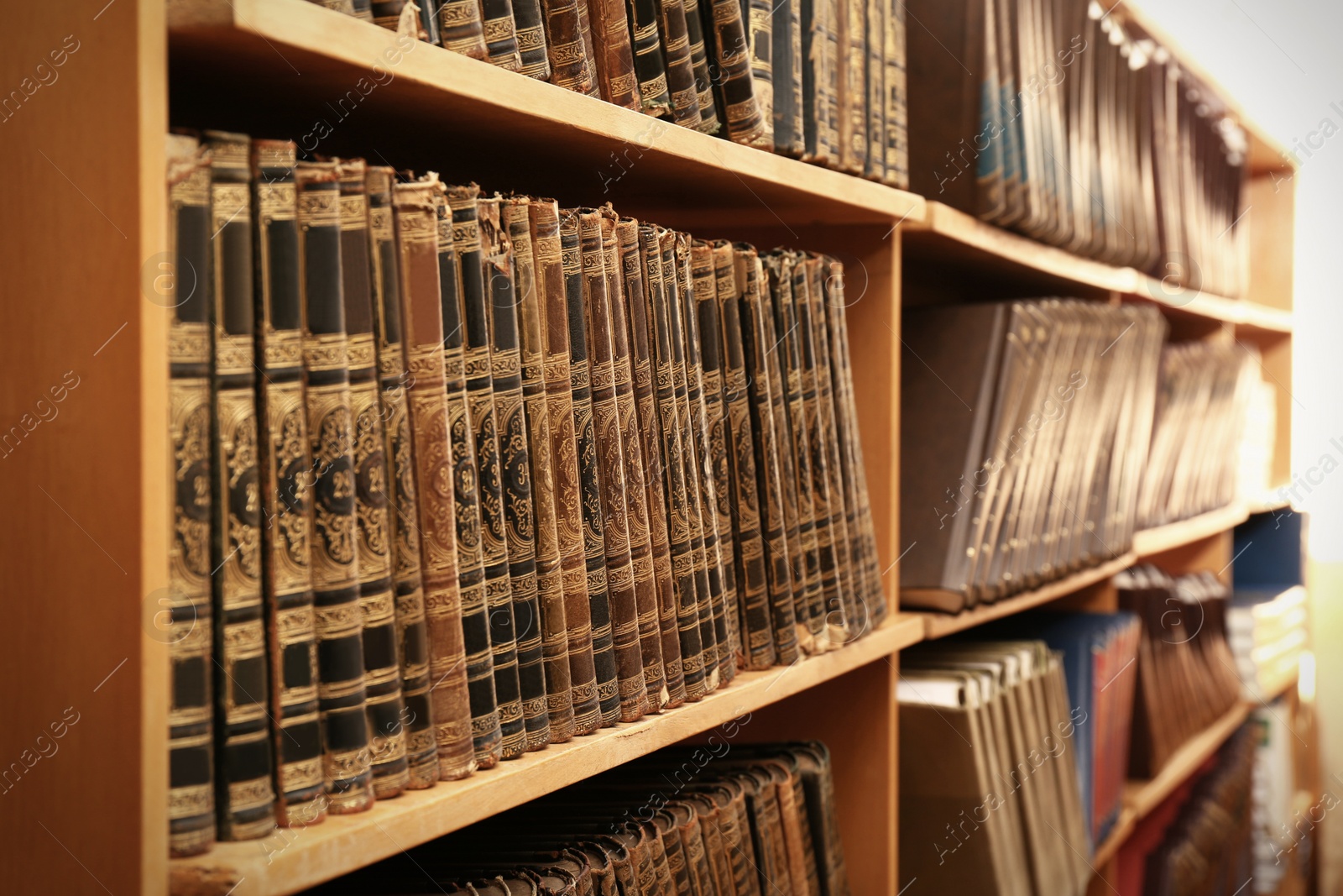 Image of Collection of old books on shelves in library