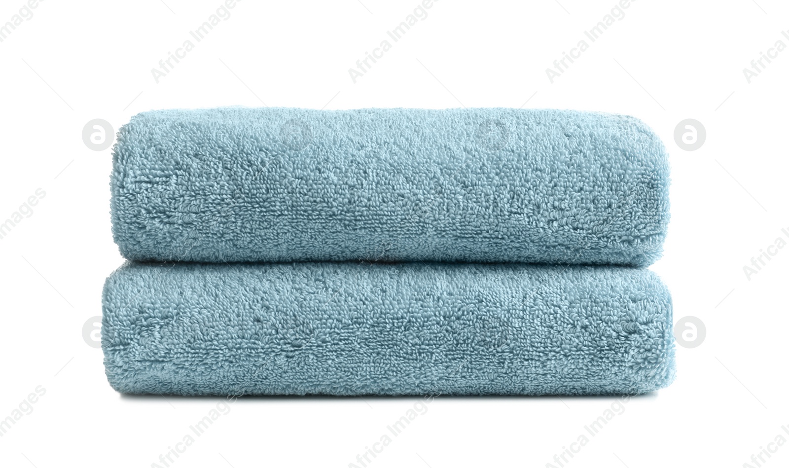 Photo of Folded clean soft towels on white background