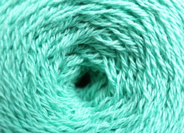 Photo of Clew of knitting threads as background, top view. Sewing stuff