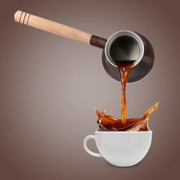 Image of Pouring freshly brewed aromatic coffee from turkish pot into cup. Objects in air on dark beige background