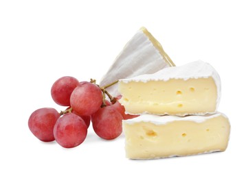 Photo of Tasty cut brie cheese with grapes on white background
