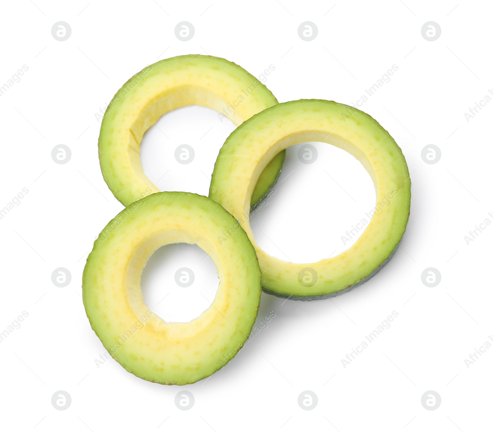 Photo of Slices of ripe avocado on white background