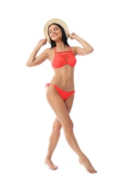 Photo of Beautiful young woman in stylish bikini with hat on white background