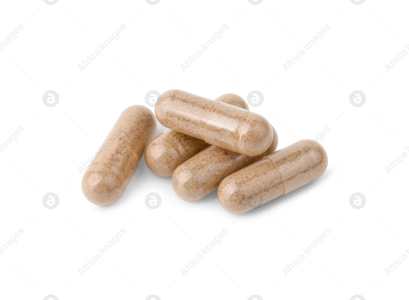Photo of Pile of vitamin capsules isolated on white
