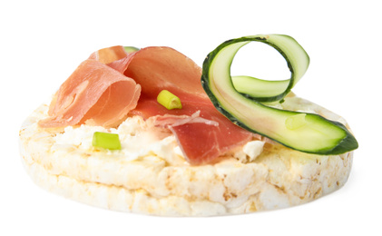 Photo of Puffed rice cake with prosciutto and cucumber isolated on white